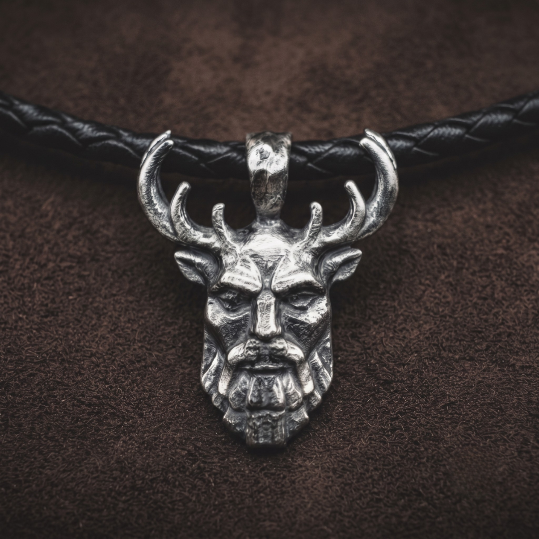 Herne — hand-poured antlered huntsman pendant in oxidized .999 fine silver on a black braided leather cord