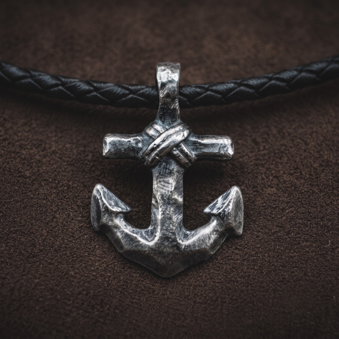 The Anchor — hand-poured anchor pendant with wound rope detail in oxidized .999 fine silver on a black braided leather cord